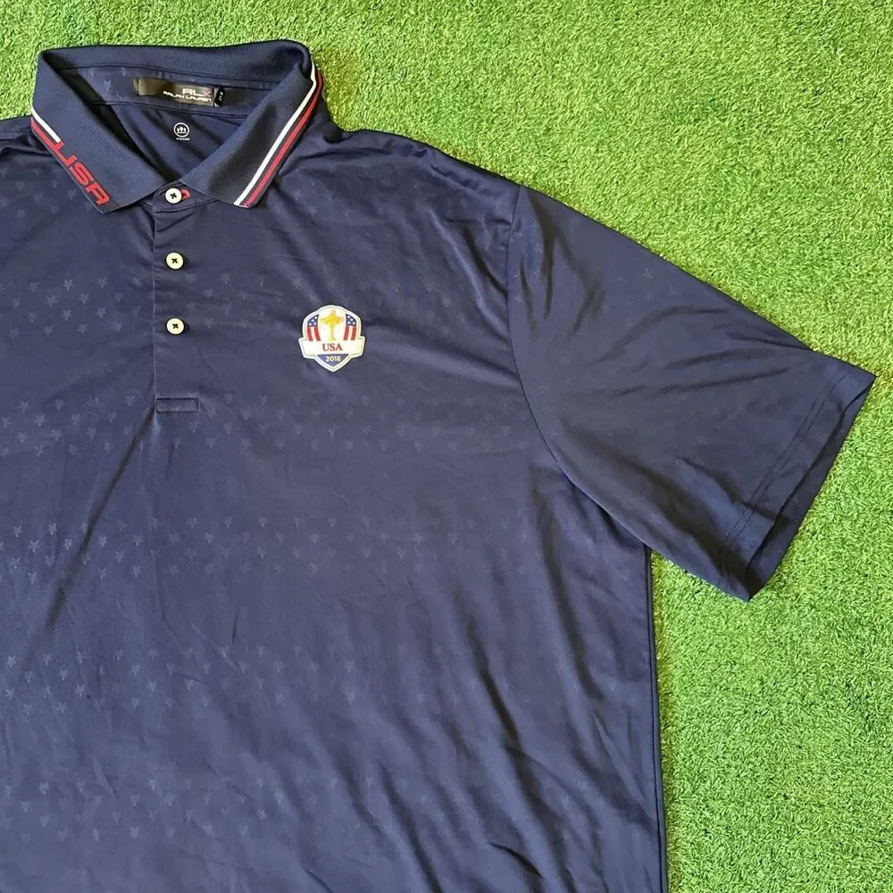 RLX Ralph Lauren Athletic Polo Shirt Mens 2XL Blue USA Open 2018 Patch Flag Logo